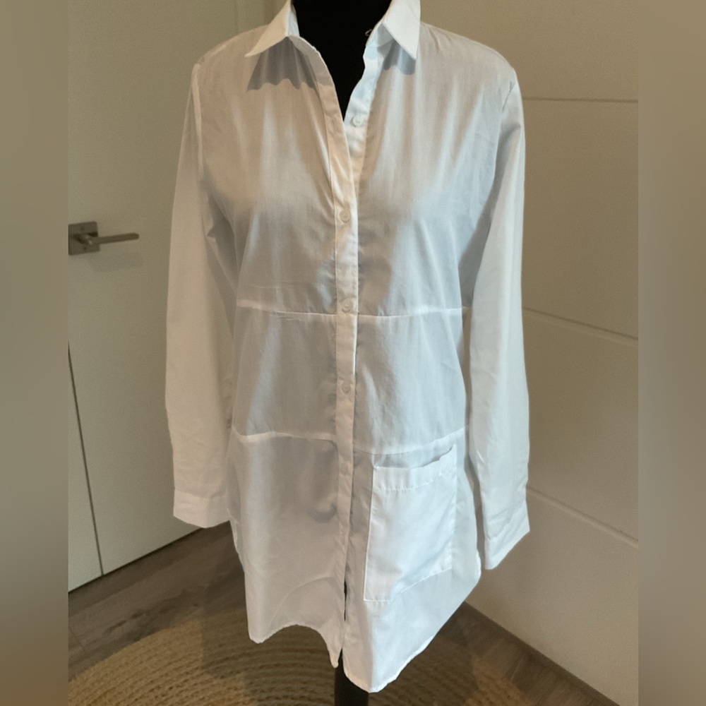 ***** Magazine Long  White Seamed Button Down Shirt with pocket.
